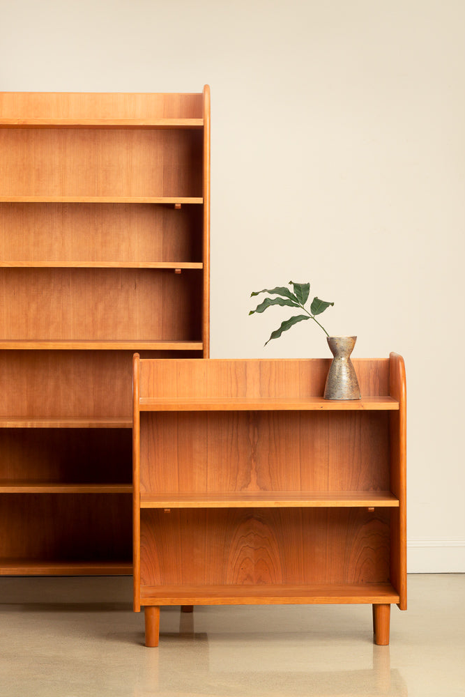 Tall and short Ricker Shelves in cherry wood styled with Buckland Ceramics