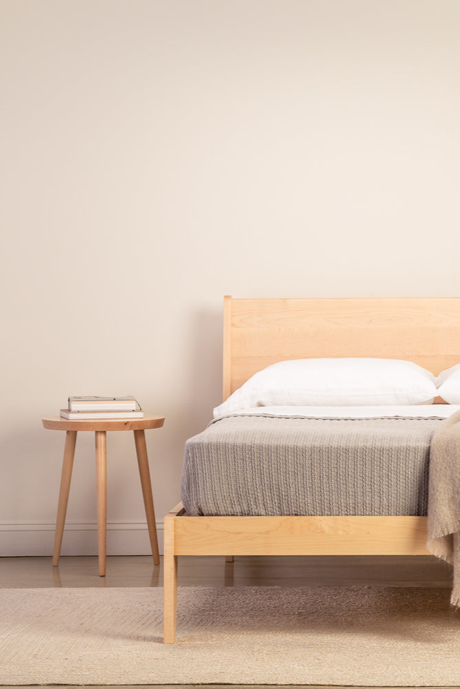 Minimalist bedroom with Mysa Nightstand and Bed in solid maple wood