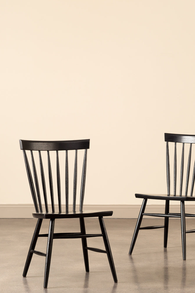 Two harvest spindle chairs painted black