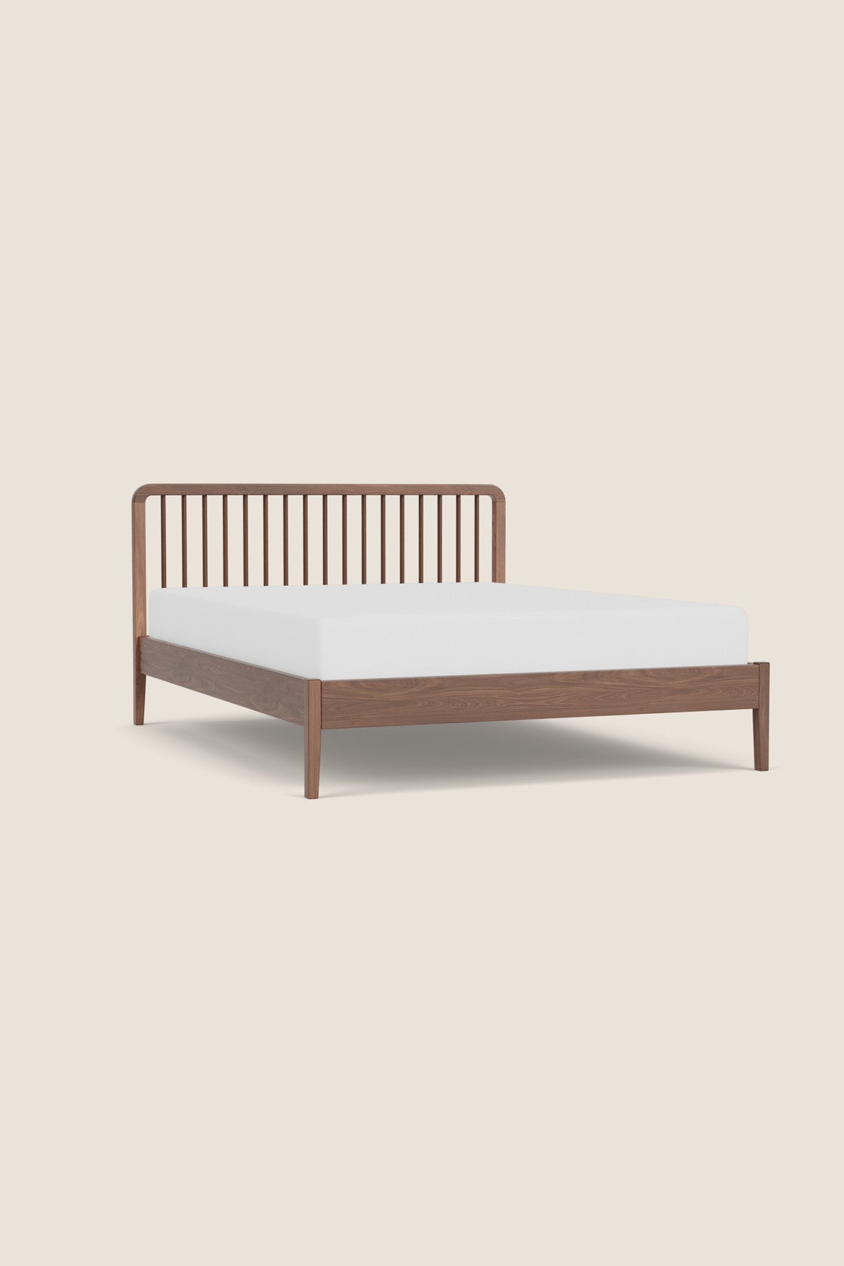 Modern Spindle bed in walnut wood from Chilton Furniture Co.