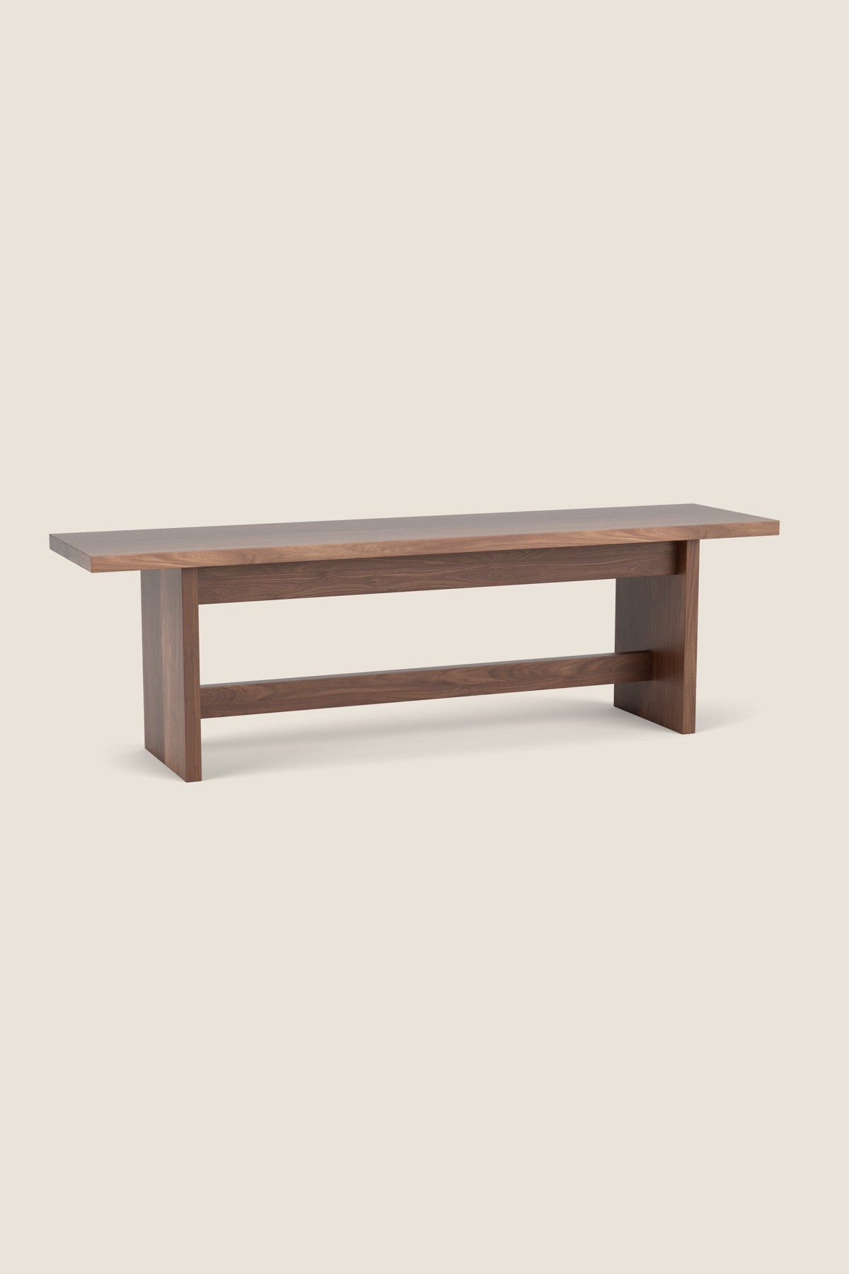 Bench with panel style trestle legs built in walnut wood.