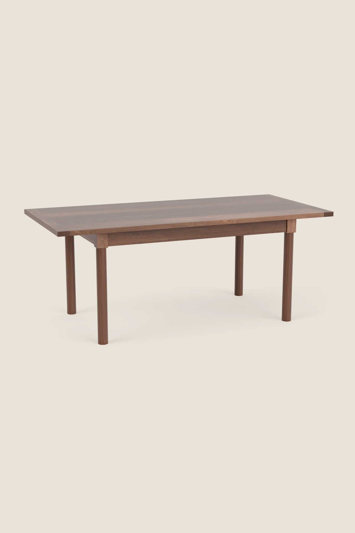 Modern Revelry dining table with straight turned legs and breadboard ends, built in solid walnut wood