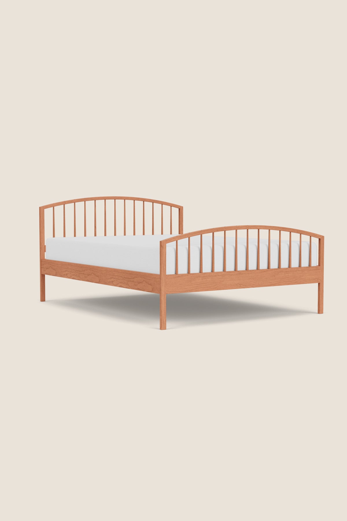 Shaker style, solid cherry wood, round spindle bed with arched head board and foot board from Maine's Chilton Furniture Co.