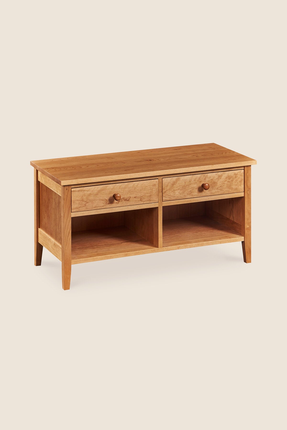 Shaker style storage bench with two drawers and cubby spaces in cherry wood