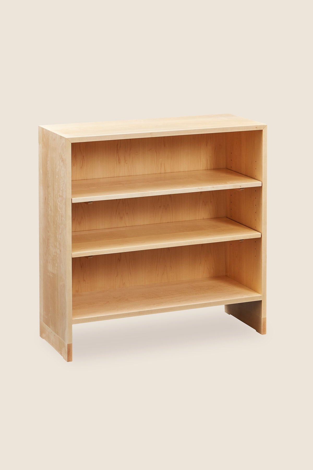 Lubec Short Shelf in maple with breadboard leg base