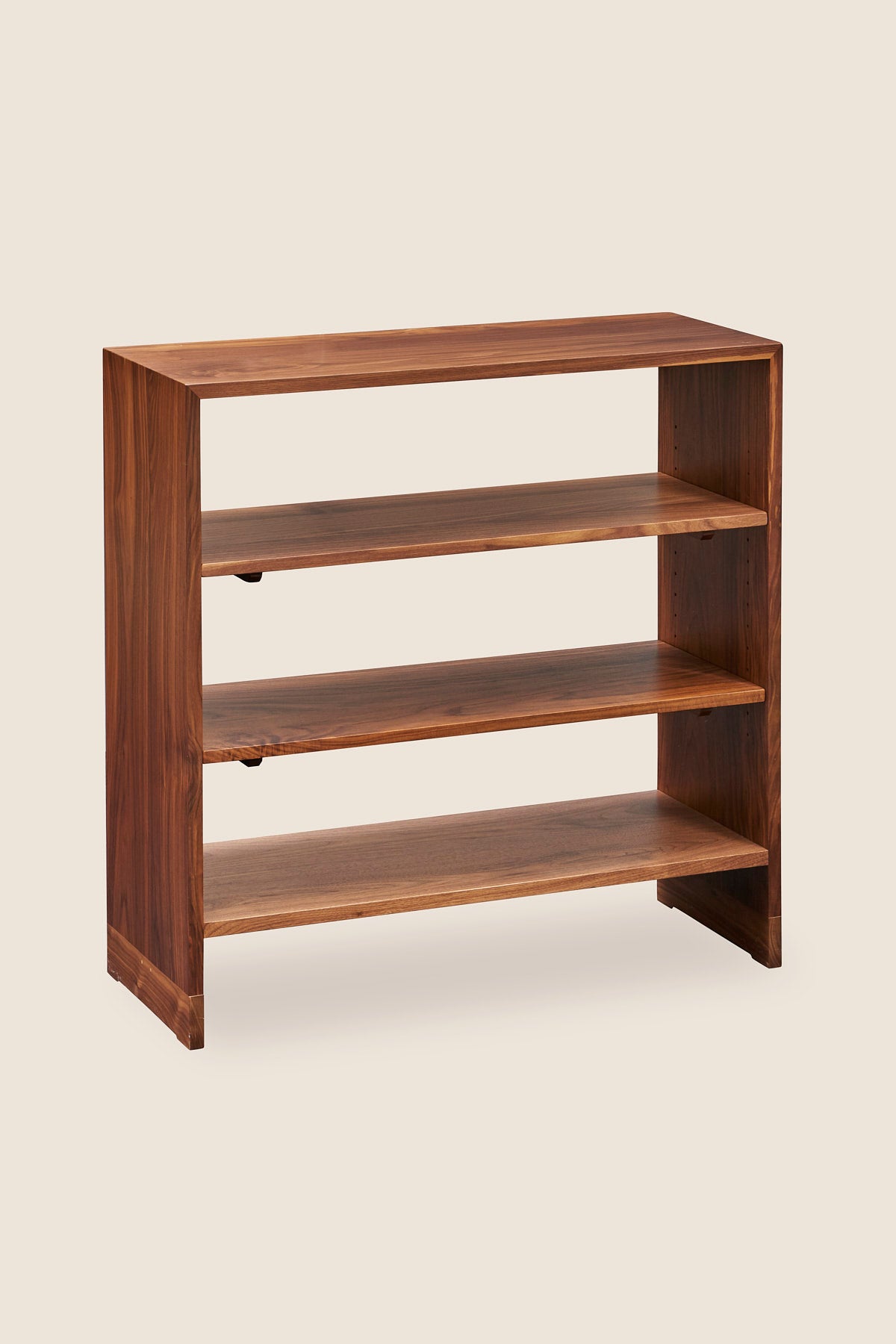 Backless Lubec Short Shelf in walnut wood with breadboard leg base