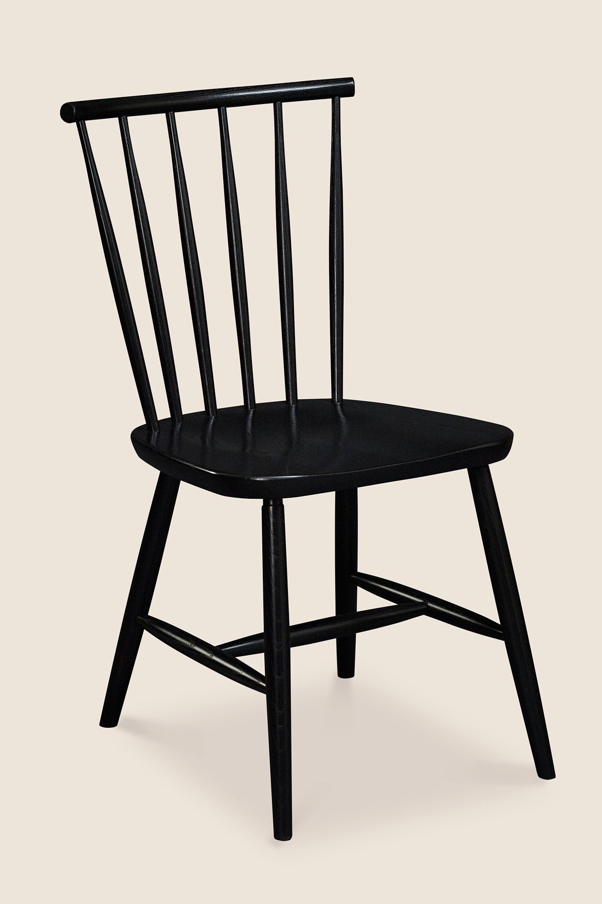 Windsor style chair with round crest in ash painted black