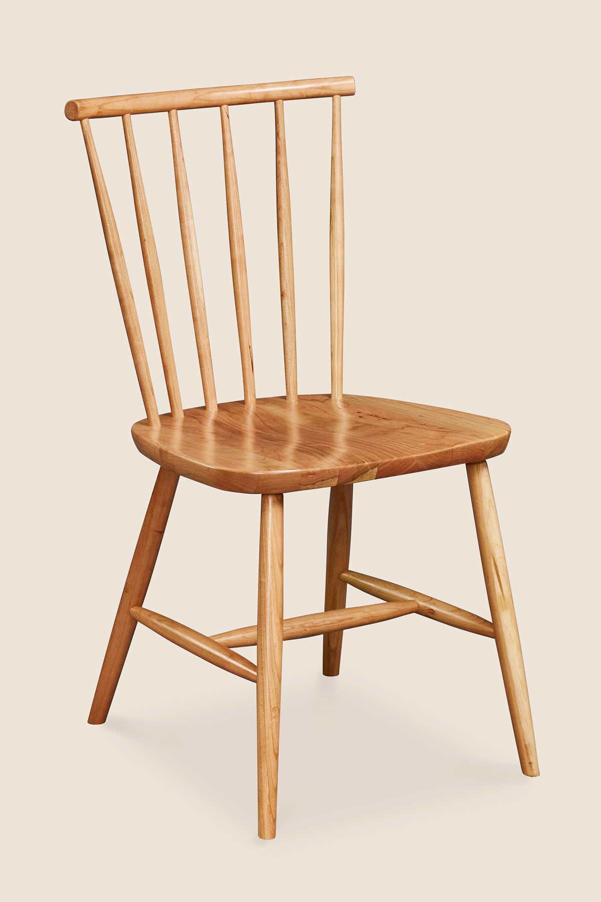 Windsor style chair with round crest in cherry