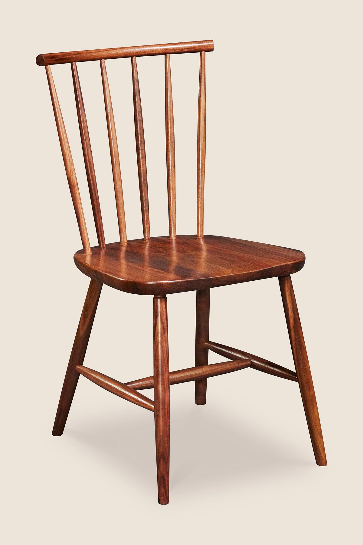 Windsor style chair with round crest in walnut