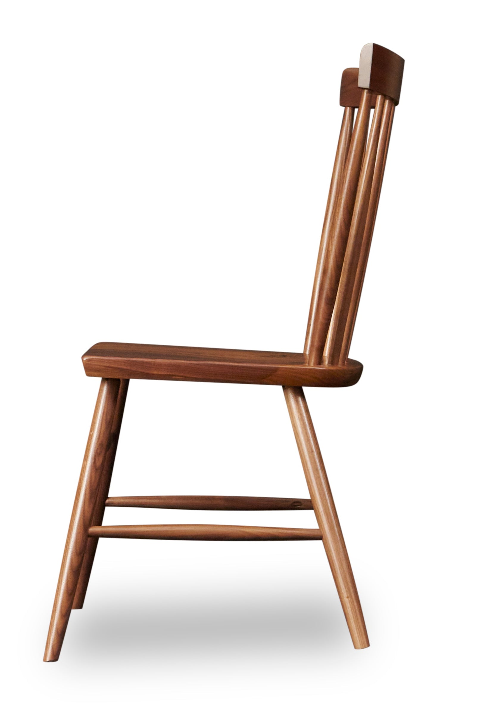 Side view of spindle style dining chair in walnut wood from Chilton Furniture