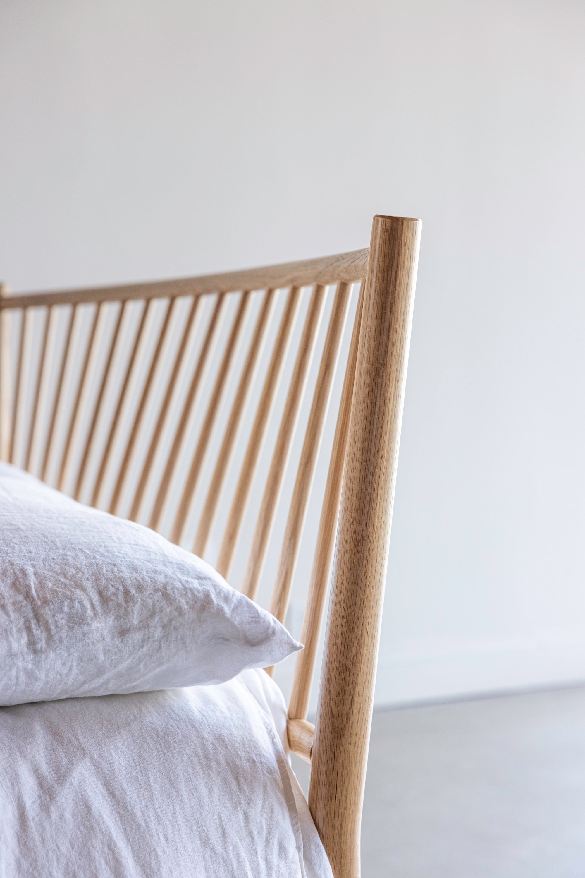 Details of the curved spindle headboard on the Chamberlain Bed from Chilton Furniture in Maine