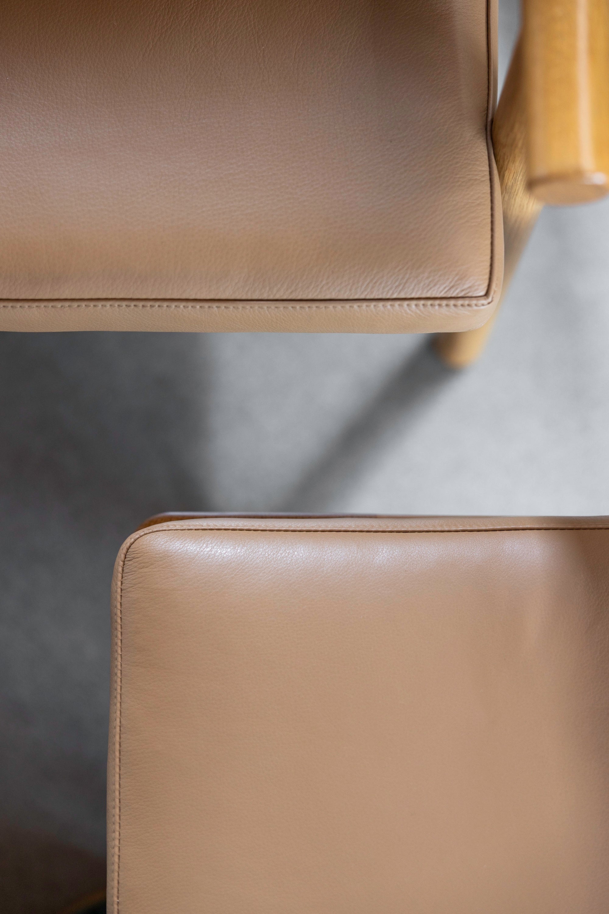 Details of Nautilus Ottoman and Lounge Chair with leather cushions from Maine's Chilton Furniture Co.