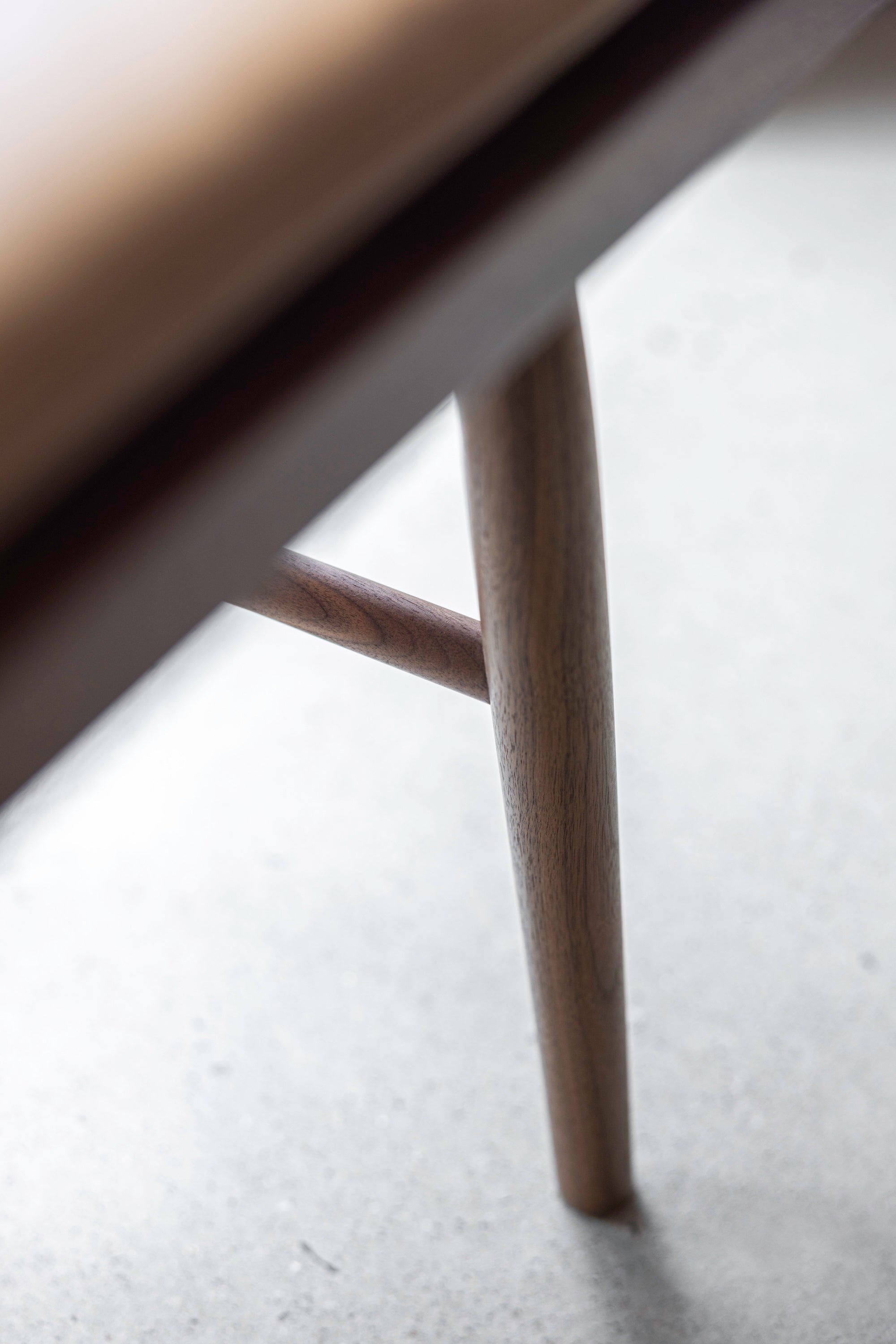 Leg and joinery details of the walnut wood Hudson Bench from Chilton Furniture