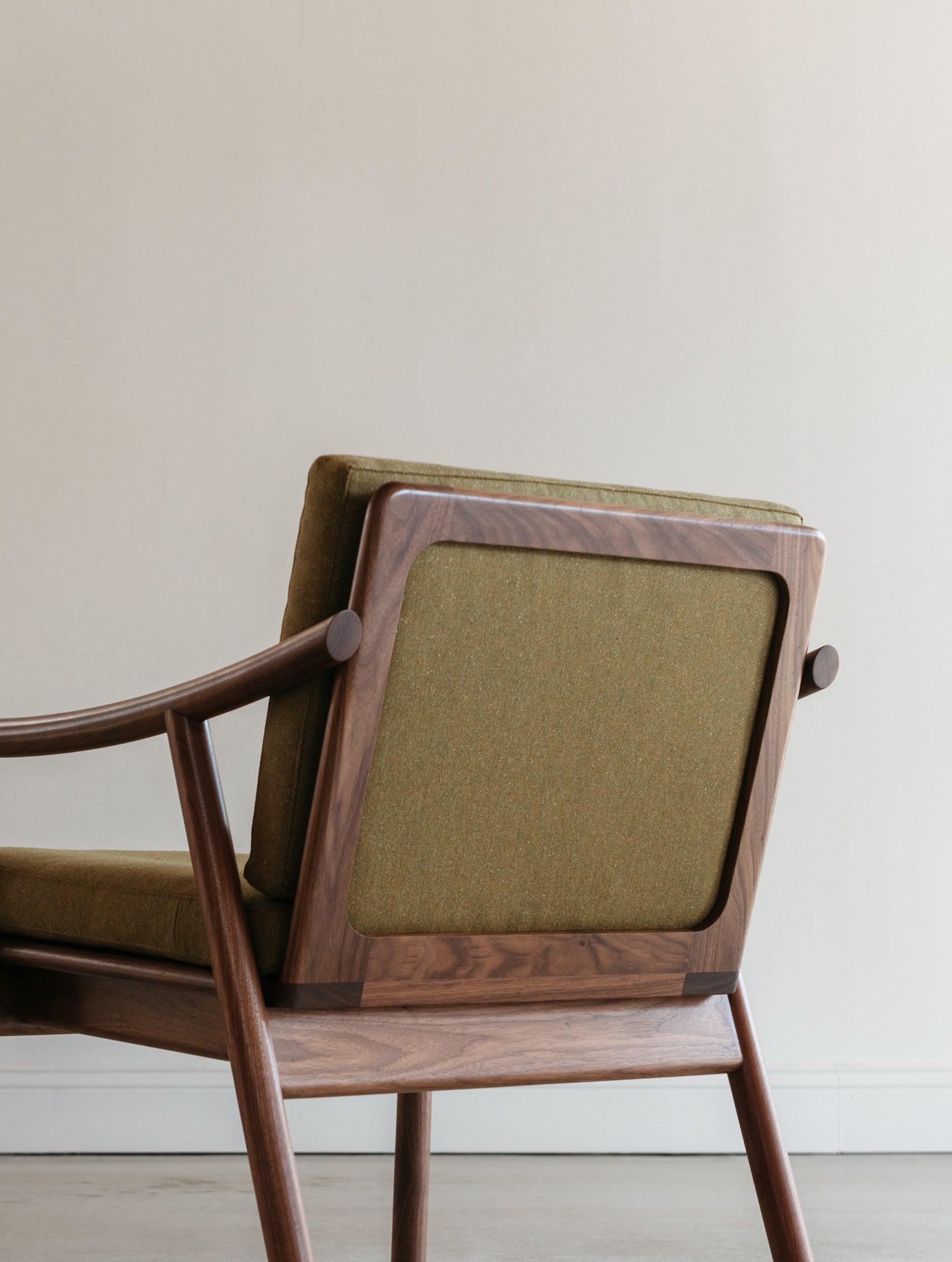 Open back of the award winning Nautilus Lounge Chair with Knoll fabric cushions, from Maine's Chilton Furniture Co.