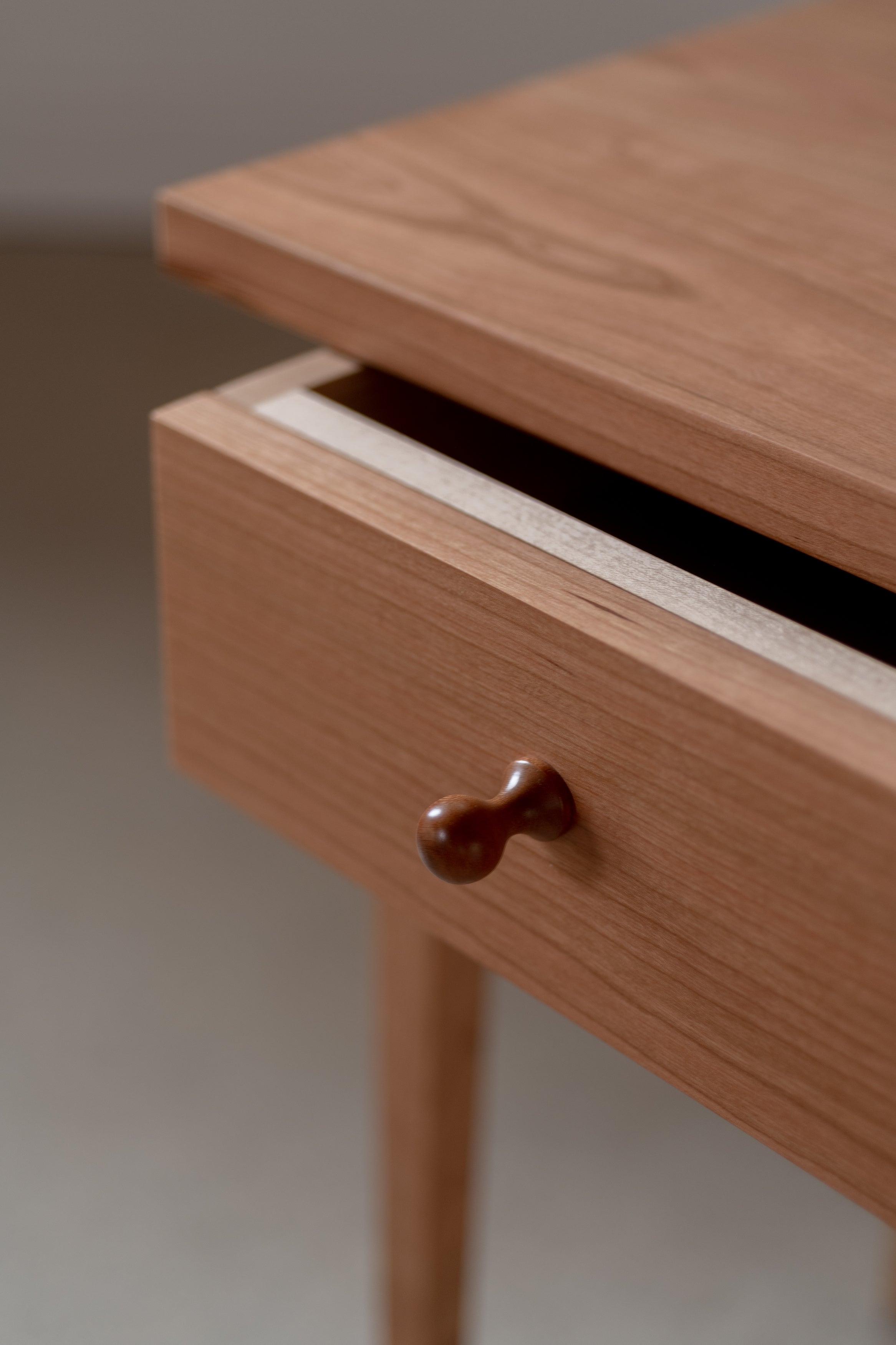 Details of the drawer and knob on the Shaker Heirloom Side Table in cherry from Chilton Furniture