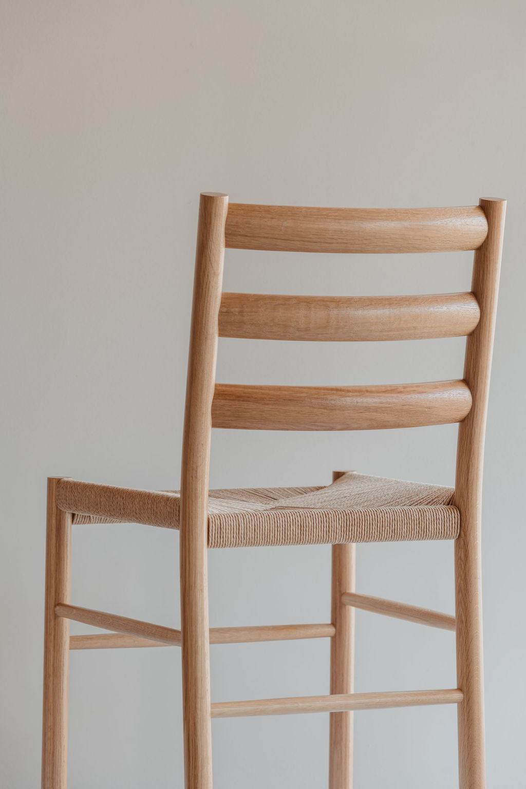 Knox ladder back Chair with woven Danish cord seat in white oak wood