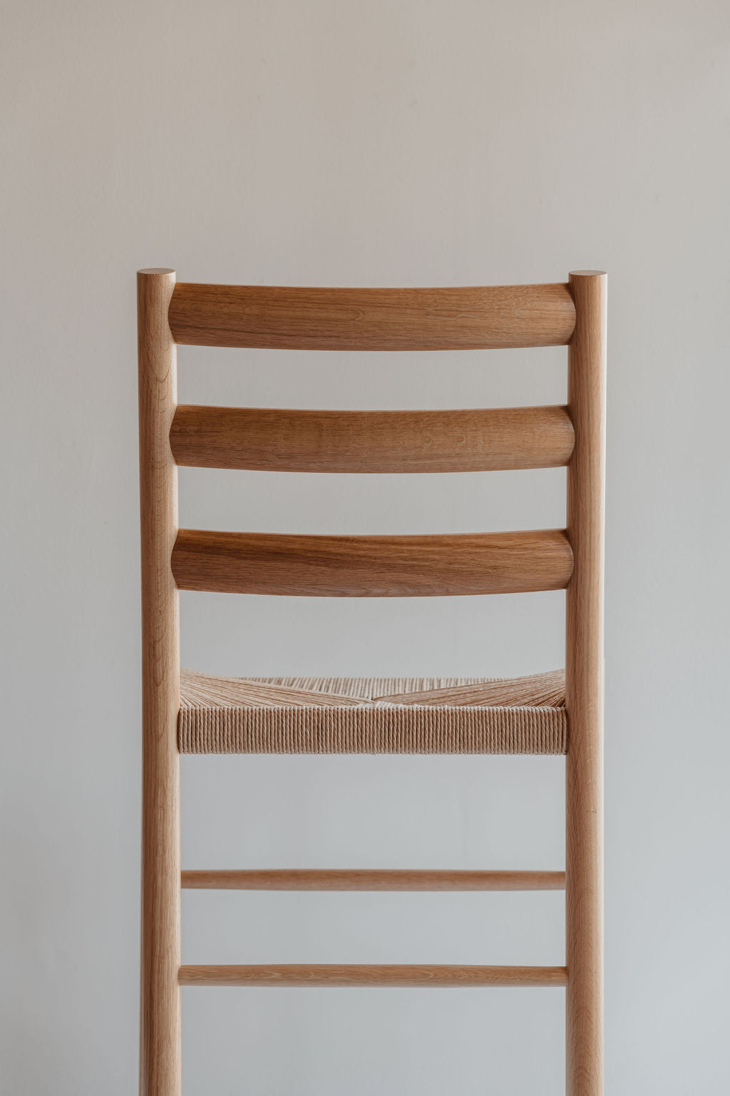 Knox ladder back Chair with woven Danish cord seat in white oak wood