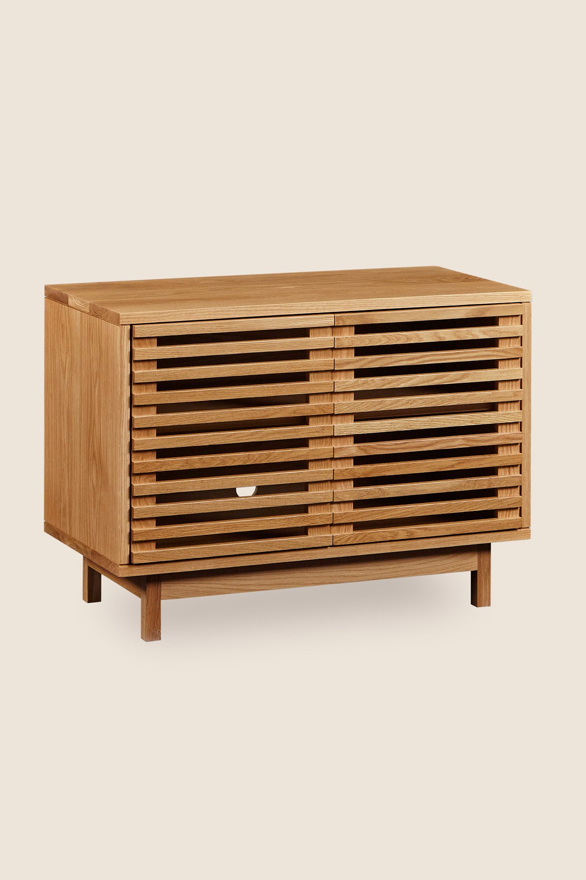 Modern slatted media stand from Chilton Furniture in small size and white oak wood