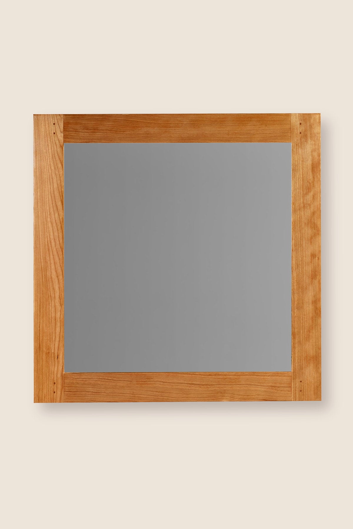 Square wall mirror with cherry wood frame