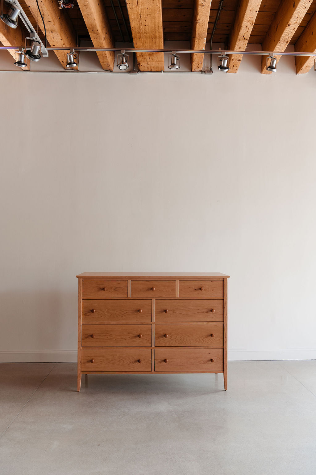 Shaker style, cherry wood nine-drawer bedroom storage dresser from Maine's Chilton Furniture