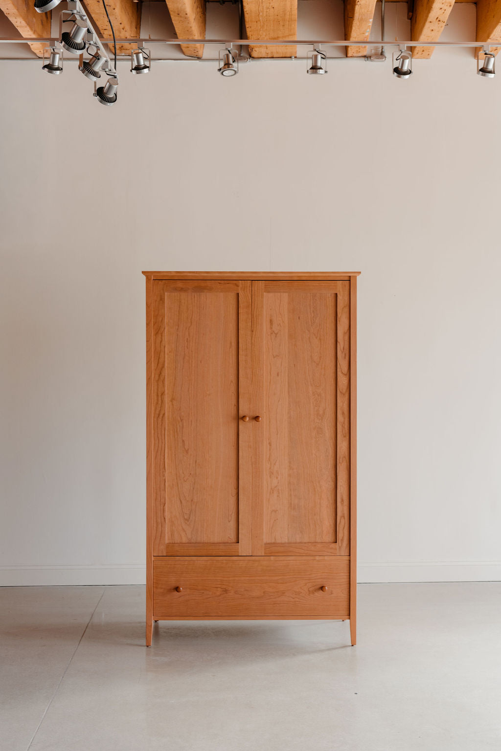 Classic solid cherry wood Shaker wardrobe with two drawers and two doors, from Maine's Chilton Furniture Co.