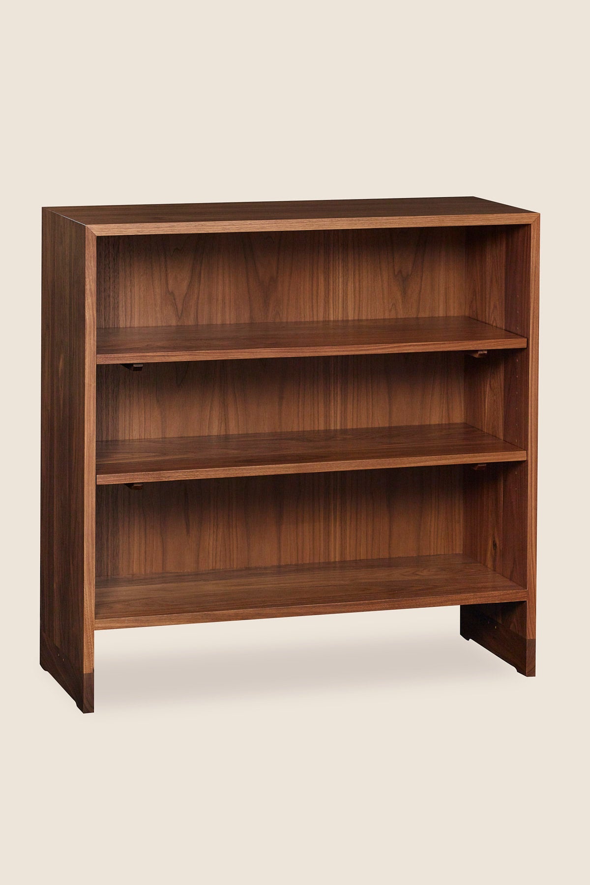 Lubec Short Shelf in walnut with breadboard leg base