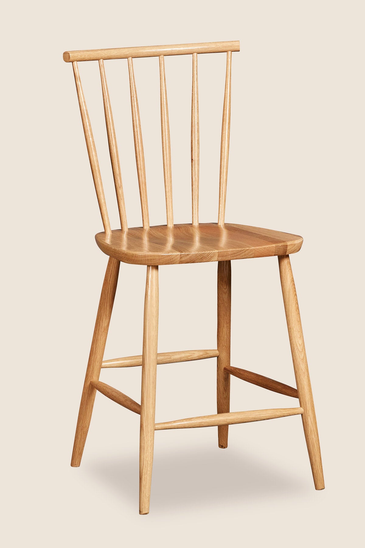 Windsor style stool with round crest in oak