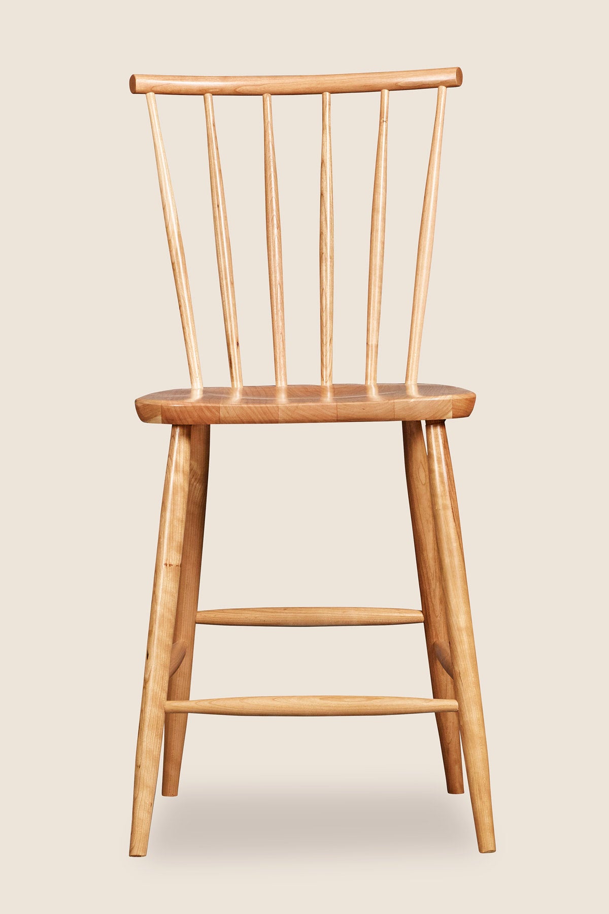 Windsor style stool with round crest in cherry