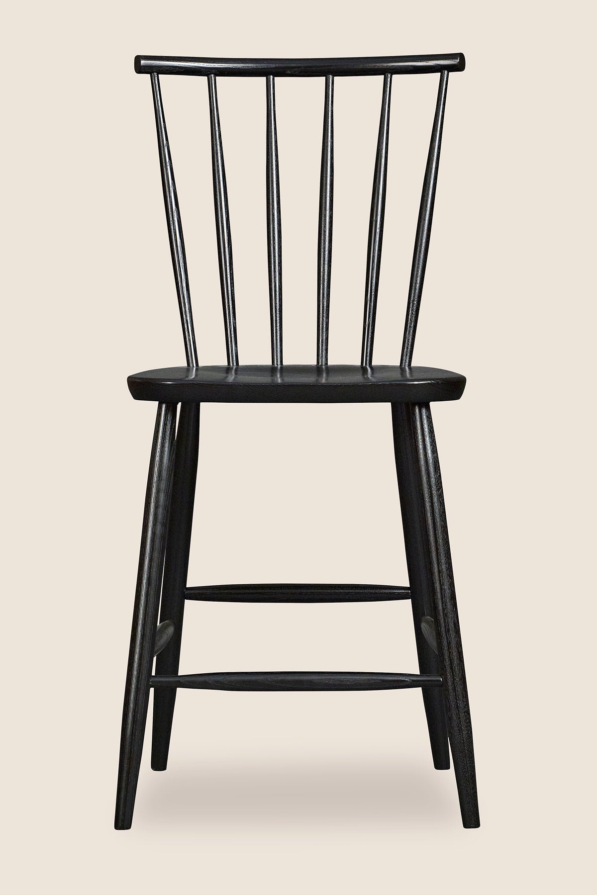 Windsor style stool with round crest in ash painted black