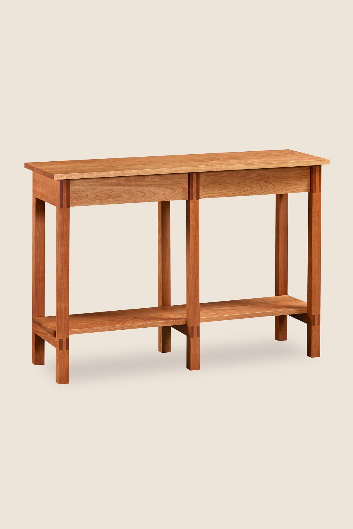 Modern sideboard with shelf and visible joinery in cherry, from Maine's Chilton Furniture Co.