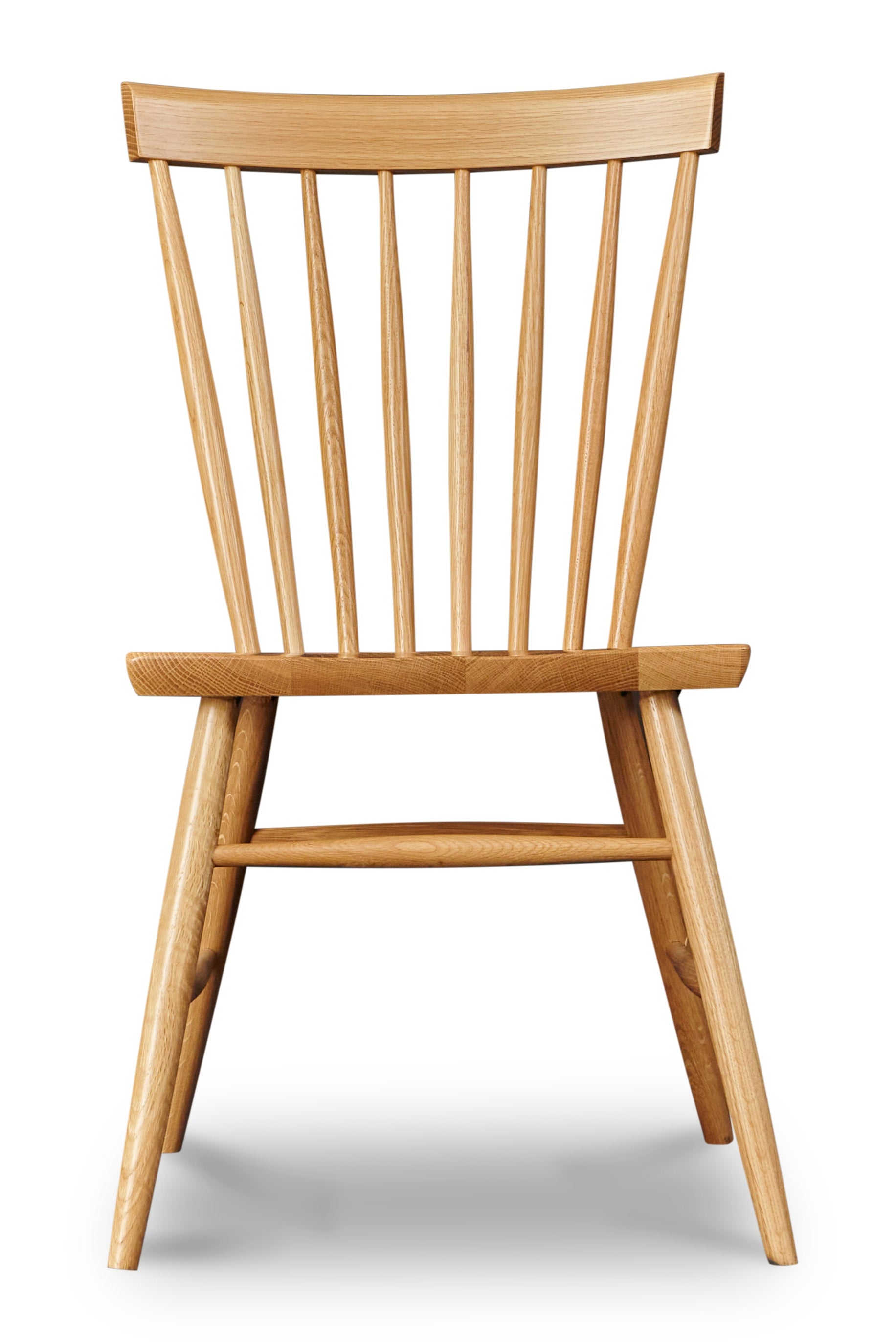 Front view of spindle style dining chair in white oak wood from Chilton Furniture