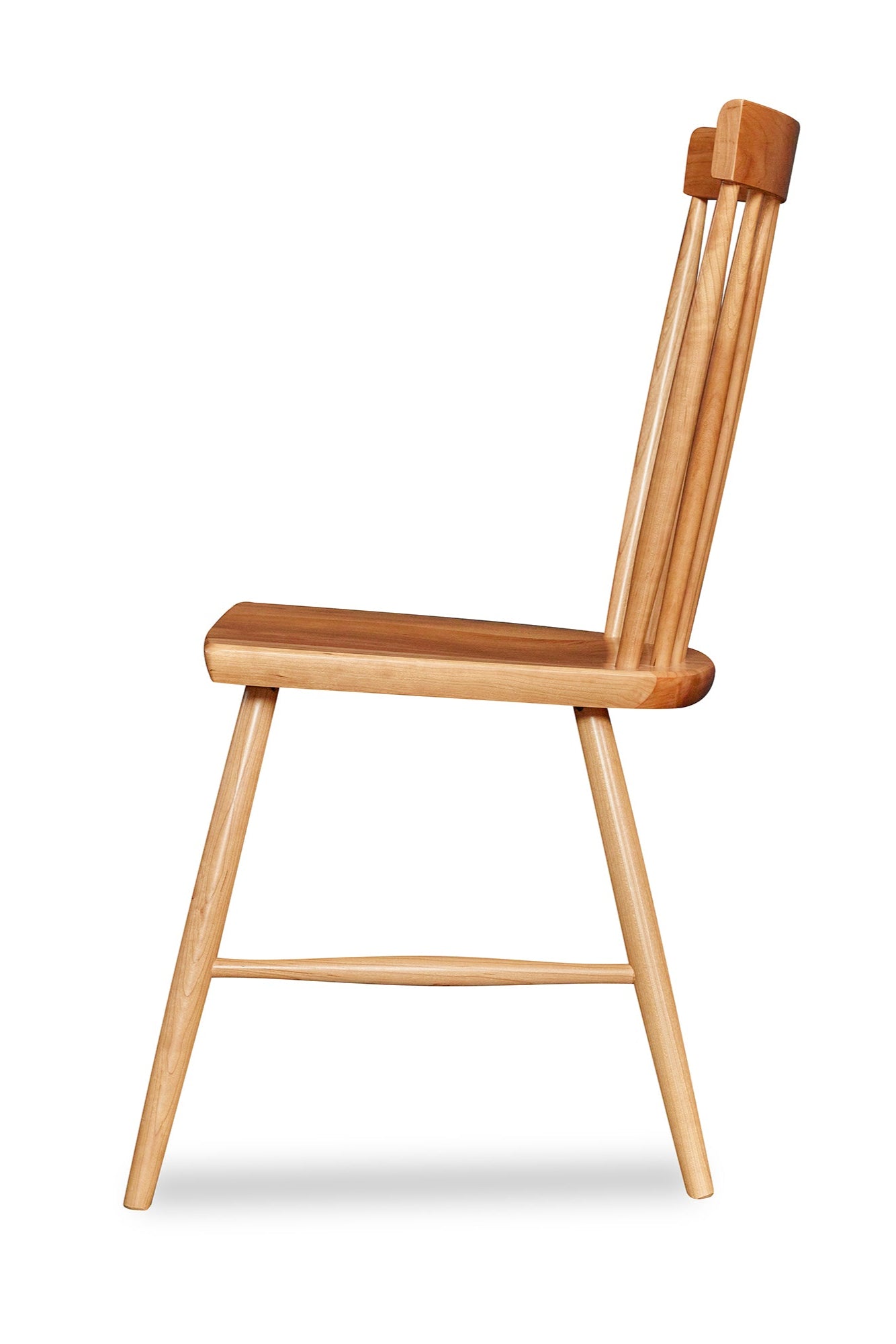 Side view of spindle style dining chair in cherry wood from Chilton Furniture