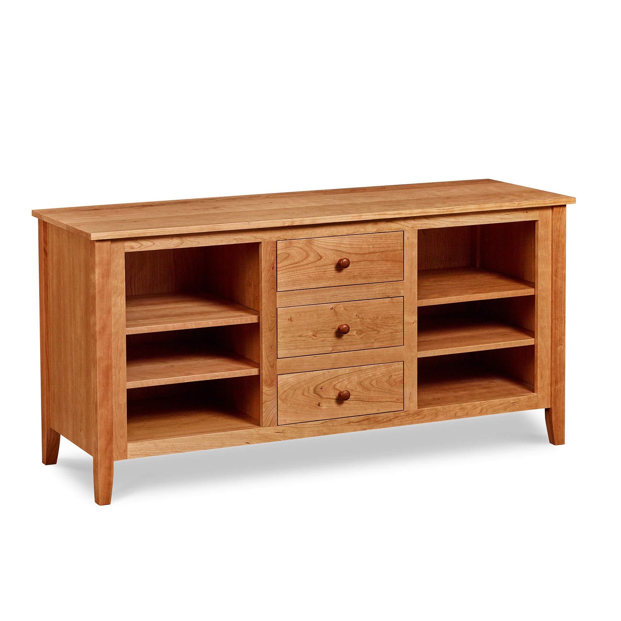 Cherry wood Salmon Falls Media Console with three centered drawers with storage shelves on both sides