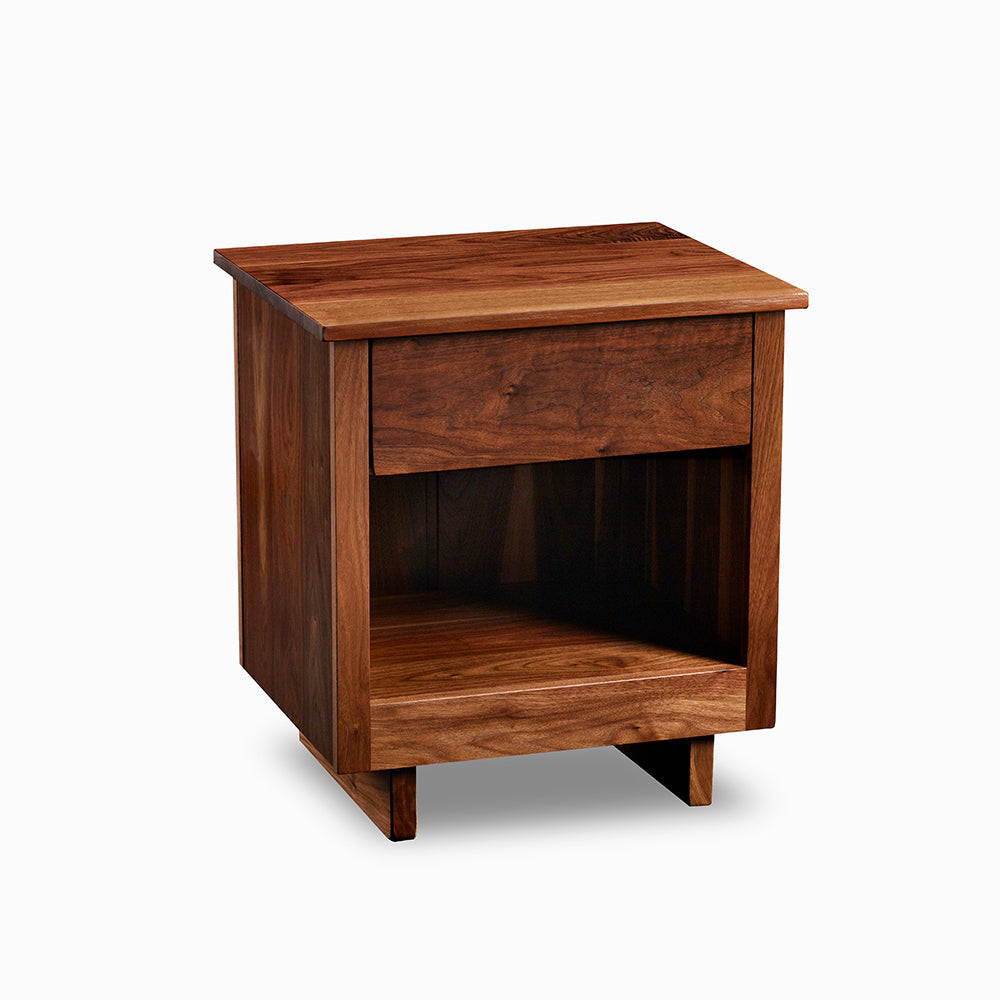 Chilton Furniture's Acadia collection one drawer walnut bedroom nightstand with under drawer pulls and panel base