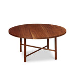Round Scandinavian style coffee table with round legs in walnut