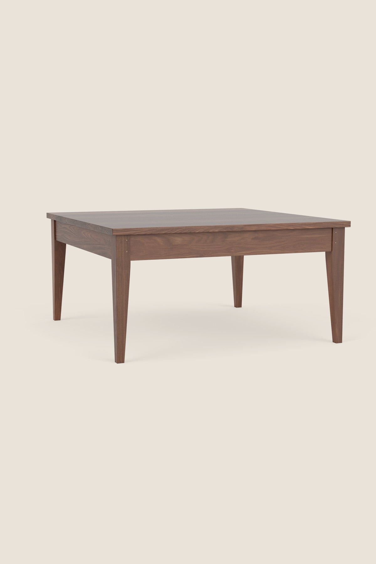 Simple Shaker style square coffee table in walnut on beige background