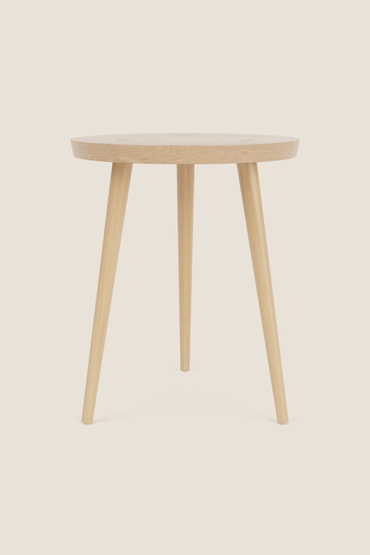 Modern round maple wood nightstand with three round tapered legs
