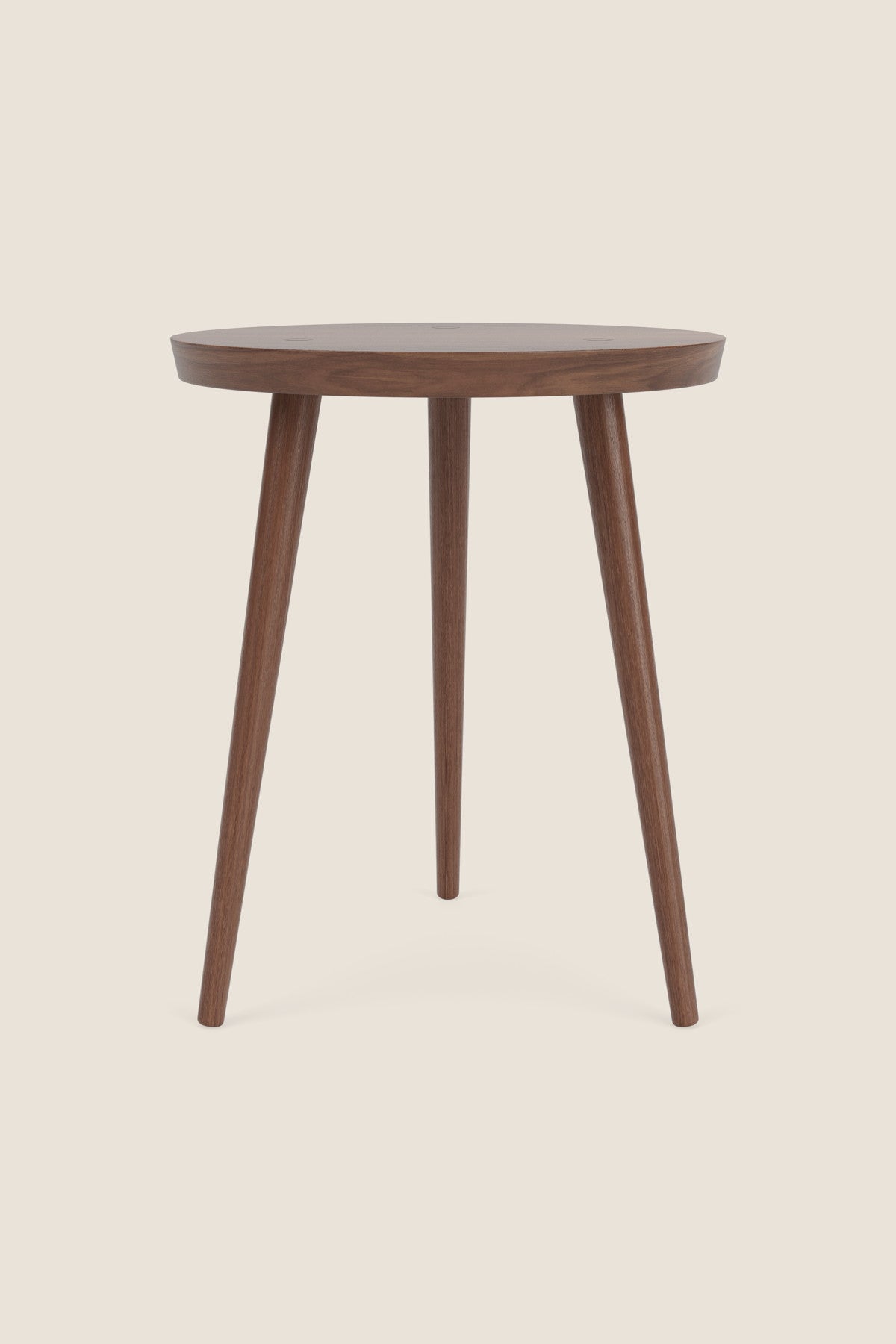 Modern round walnut nightstand with three round tapered legs