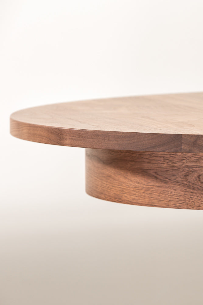 Highland solid walnut oval dining table from Mazhil & Co..