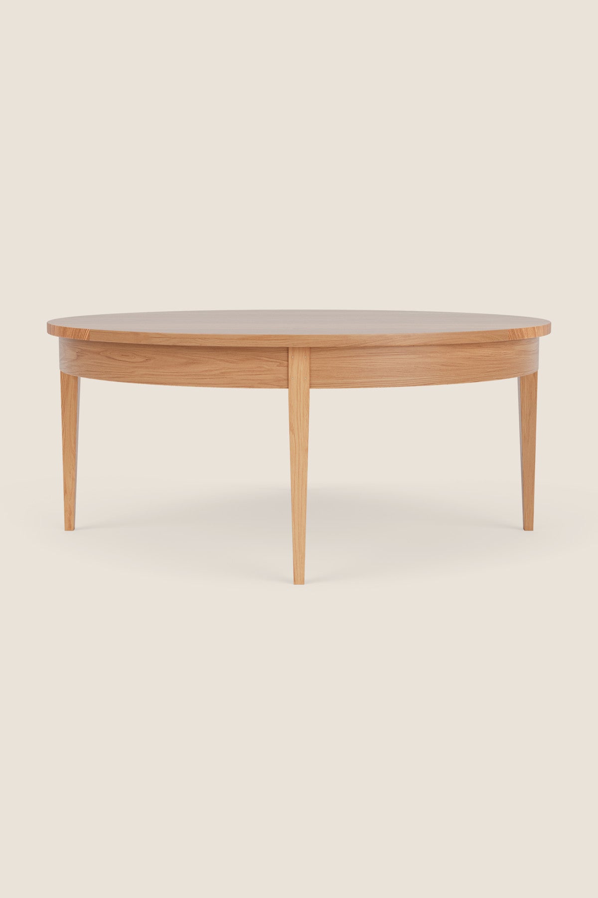 Round Shaker Heirloom Coffee Table in white oak on beige background
