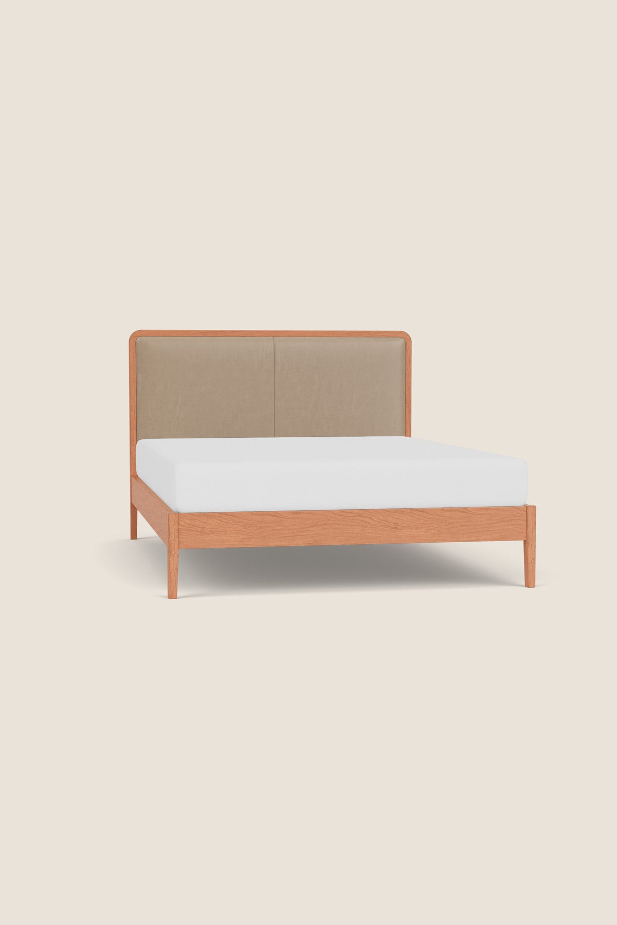 Dune Upholstered Bed built from cherry wood from Chilton Furniture in Maine