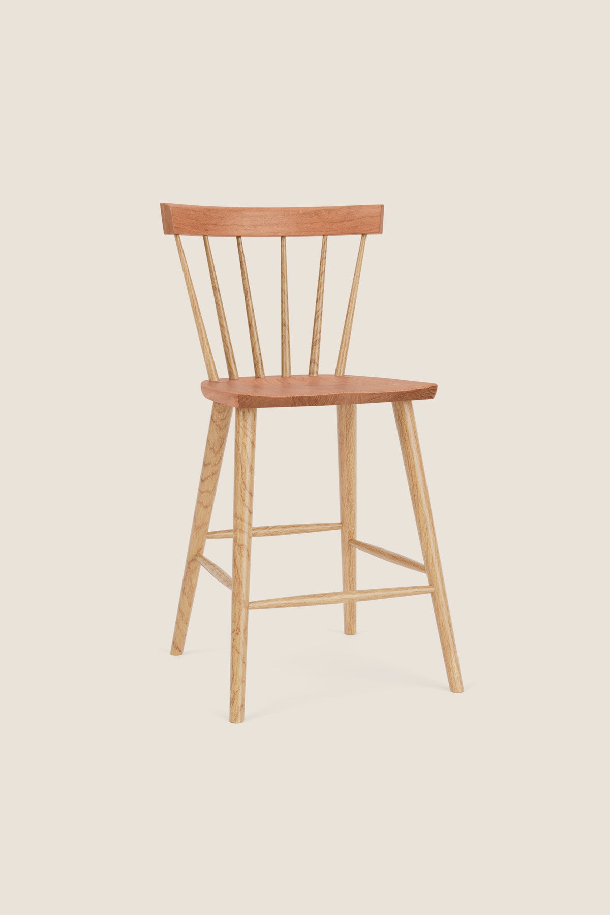 Modern Windsor inspired spindle stool with curved back in cherry and ash