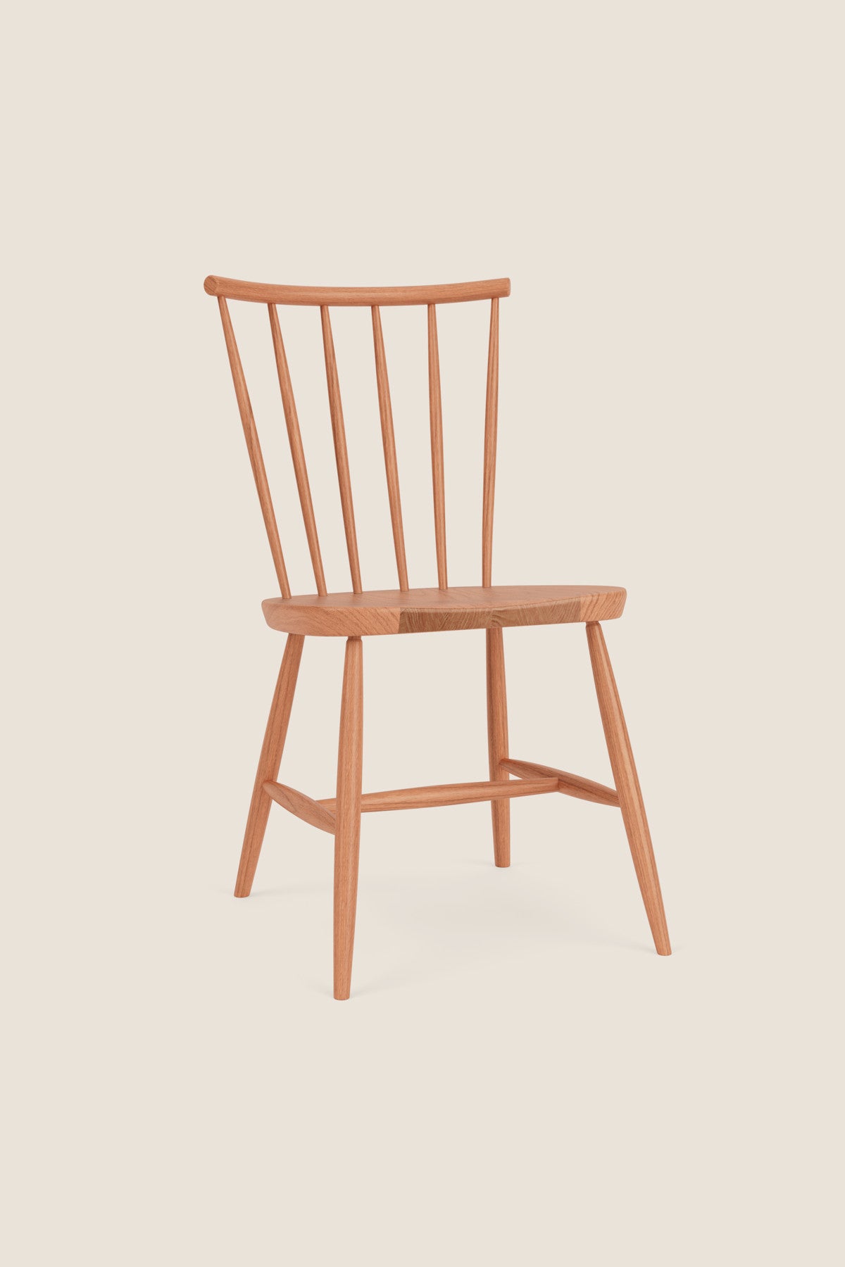Windsor style chair with round crest in cherry