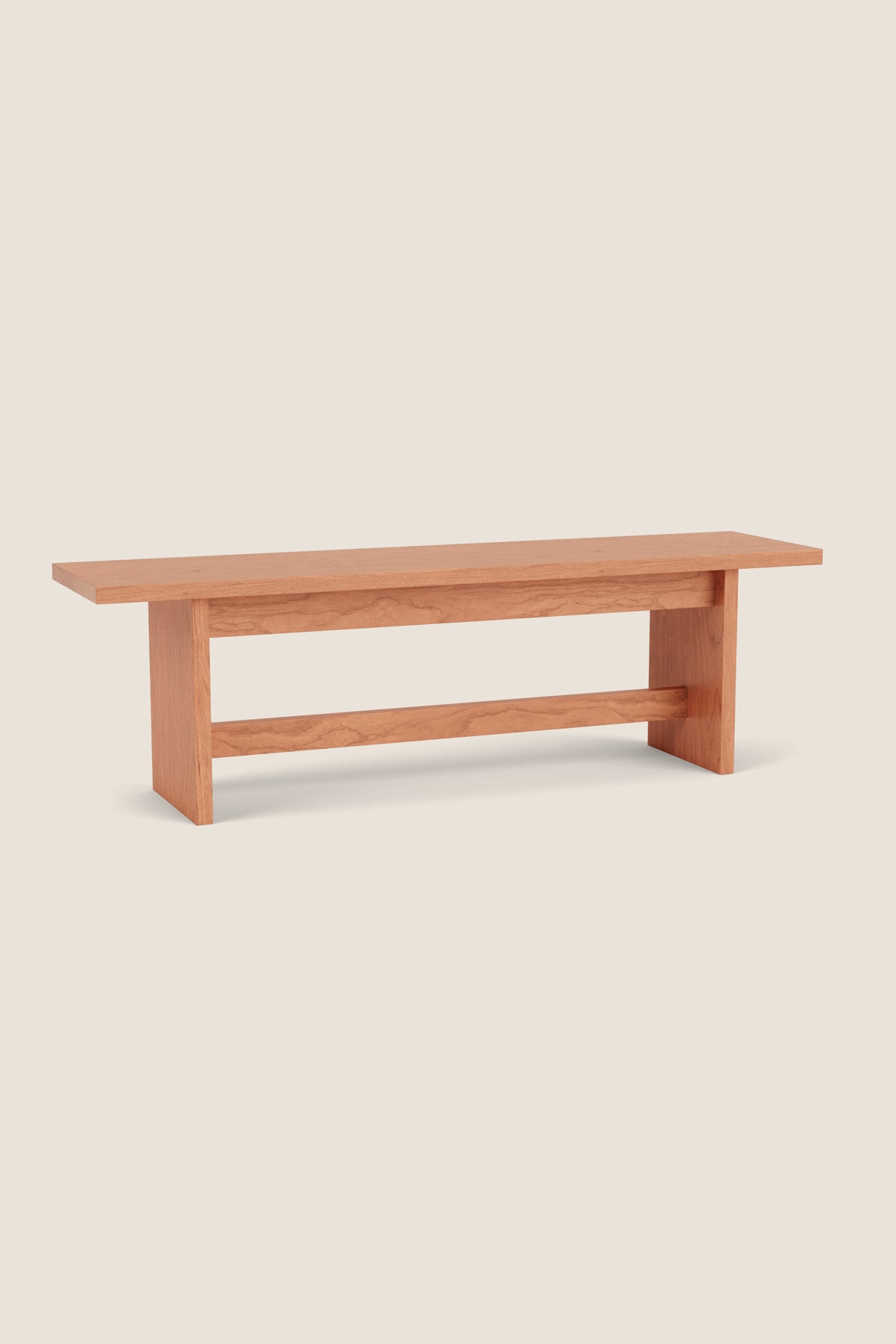 Bench with panel style trestle legs built in cherry wood.