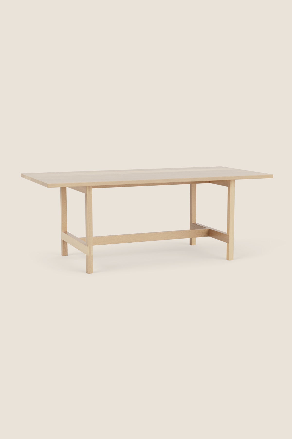 Modern trestle table with visible joinery in maple, from Arkansas's Mazhil & Co. Co.