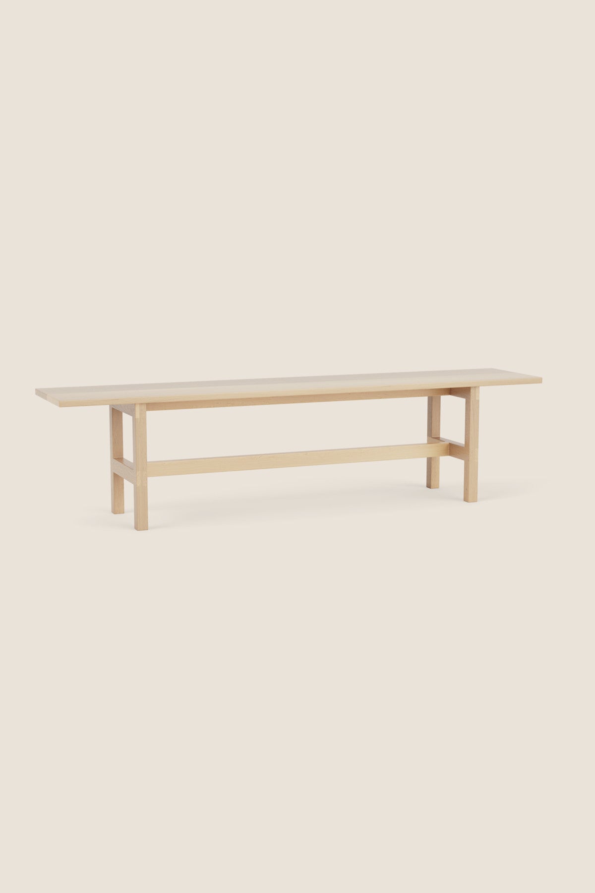 Modern trestle bench with visible joinery in maple wood, from Maine's Chilton Furniture