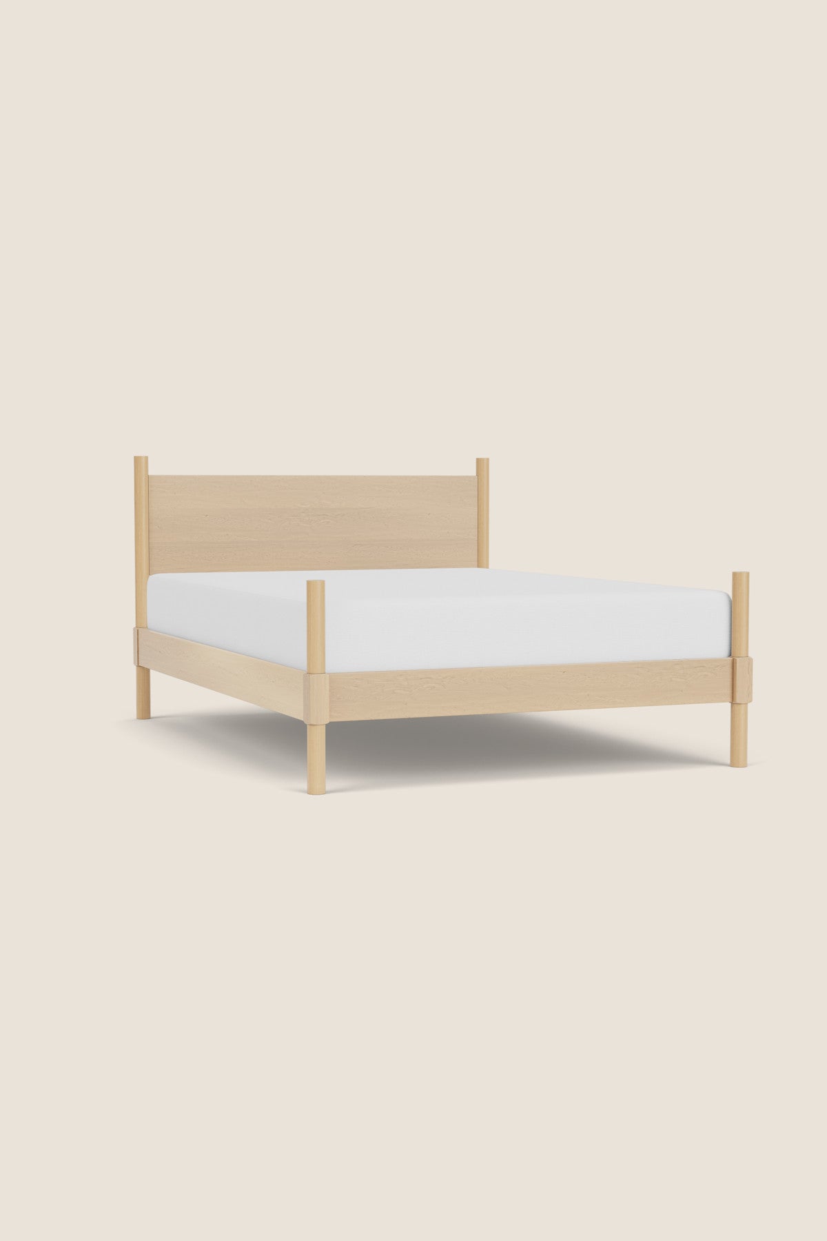 Maple wood MS1 Bed with round headboard and footboard posts on traditional Shaker style bed with white mattress