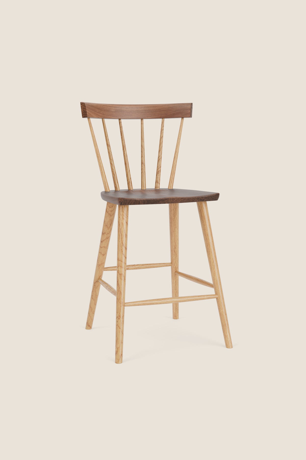 Modern Windsor inspired spindle stool with curved back in walnut and ash