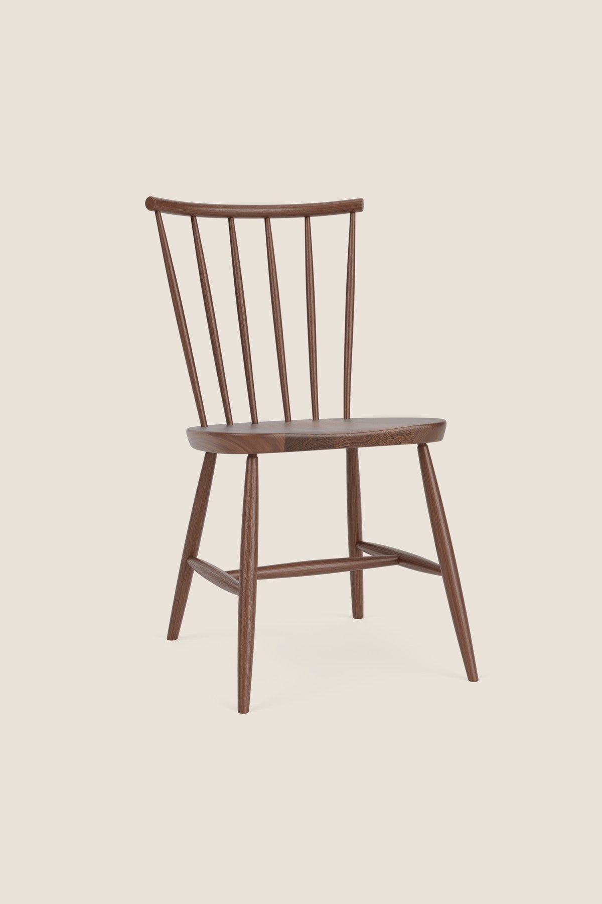 Windsor style chair with round crest in walnut