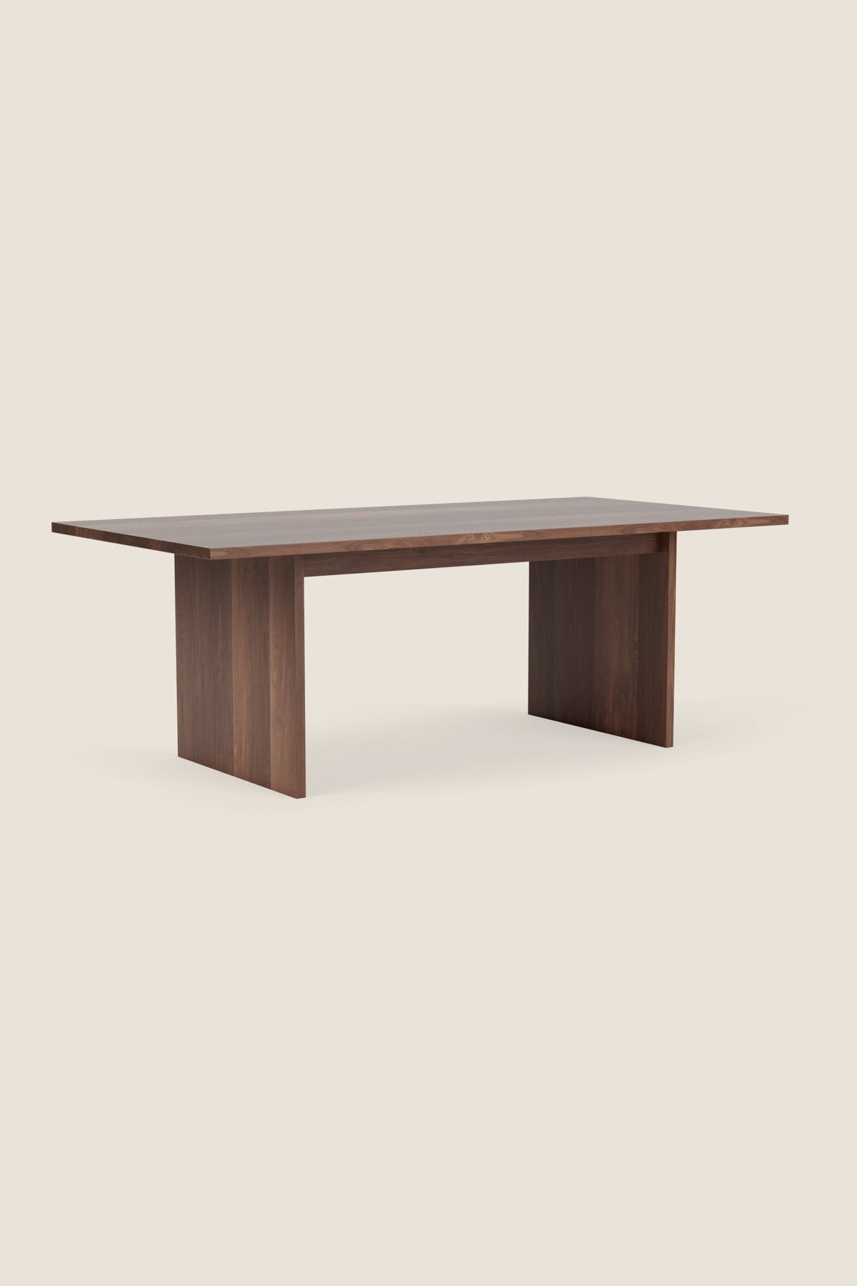 Modern handcrafted wood dining table with panel style legs in solid walnut.